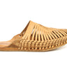 Natural leather slip-on sandals with hand-woven diamond centerpiece