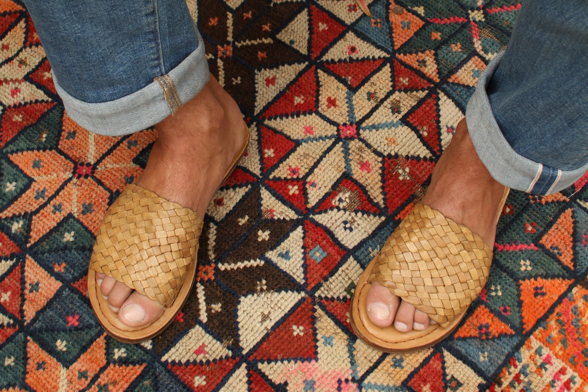 Colorful hand made Indian slippers for sale at an outdoor market | Indian  shoes, Footwear, Leather sandals